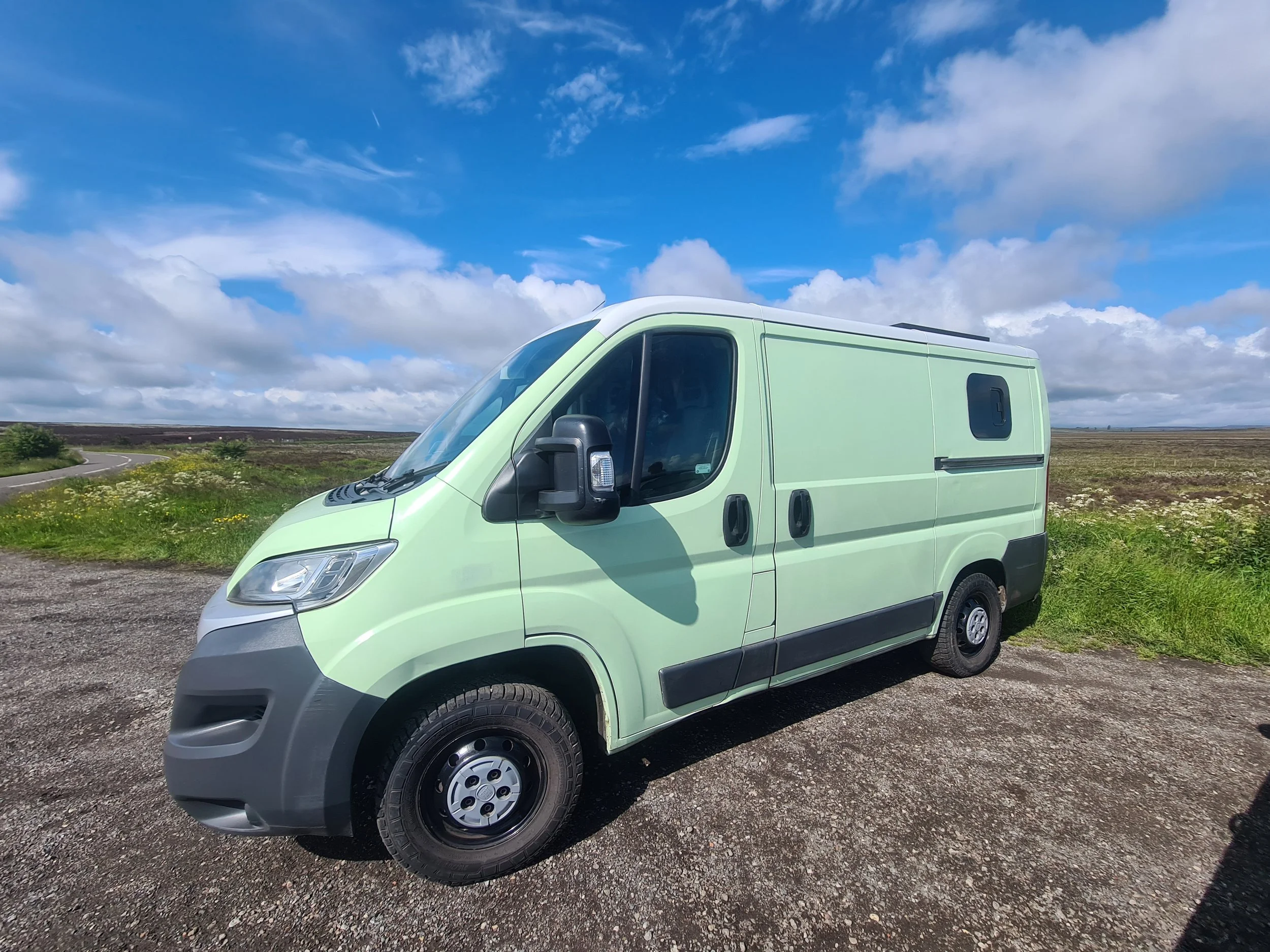 SWB Fiat Ducato. Fully off grid, Gas free, Lifting bed, Seating for 4, Live edge yew table, Kitchen, Full height wardrobe, Composting toilet. Photo 15 of 22.