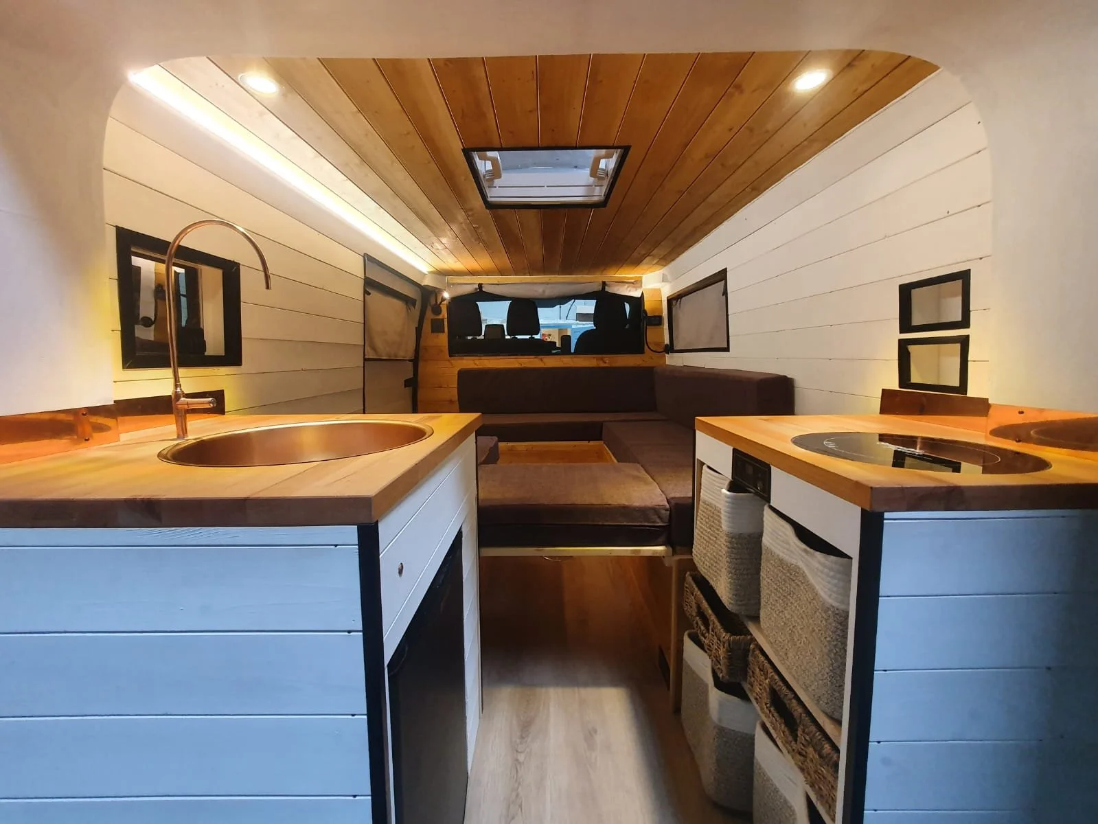 Luna. U shaped seating, Extra large king sized bed, Rear kitchen, Off-grid, Gas free, Induction hob, Fridge. Photo 10 of 12.