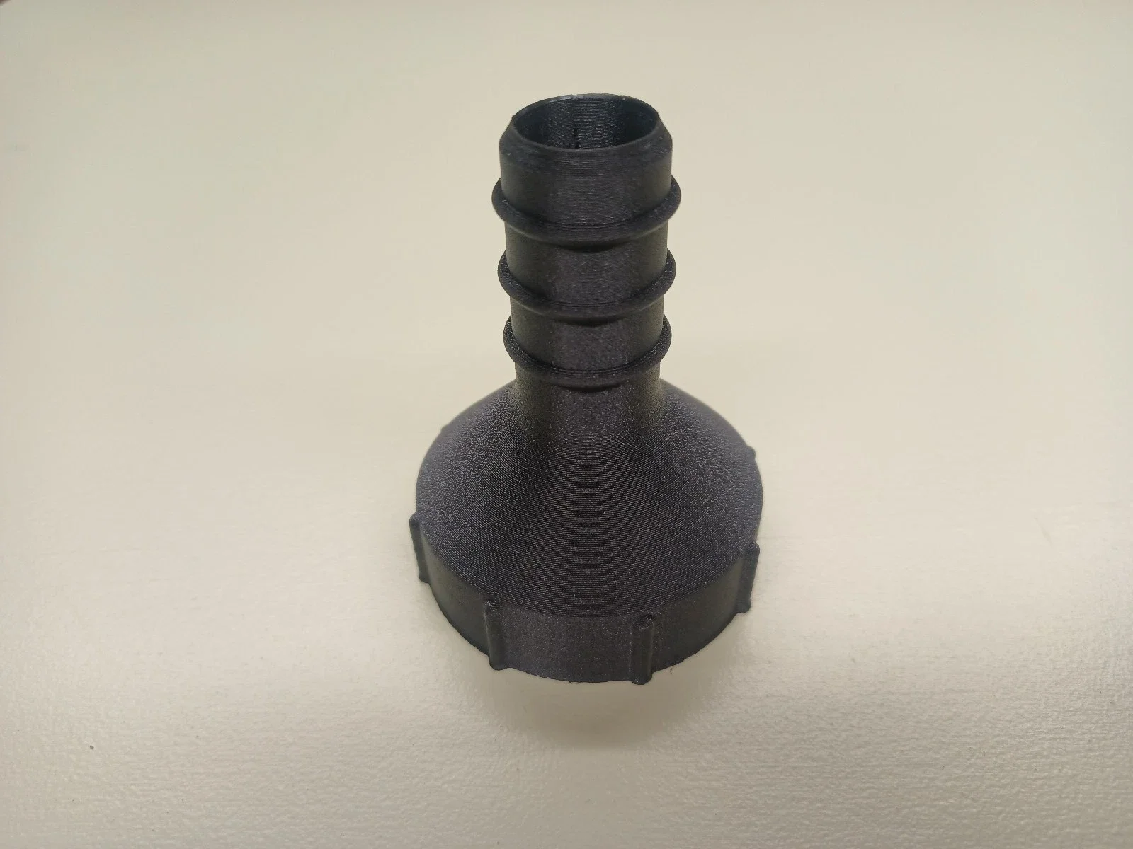 Straight 1 1/2 inch BSP female to 20mm hosetail for a campervan sink waste.