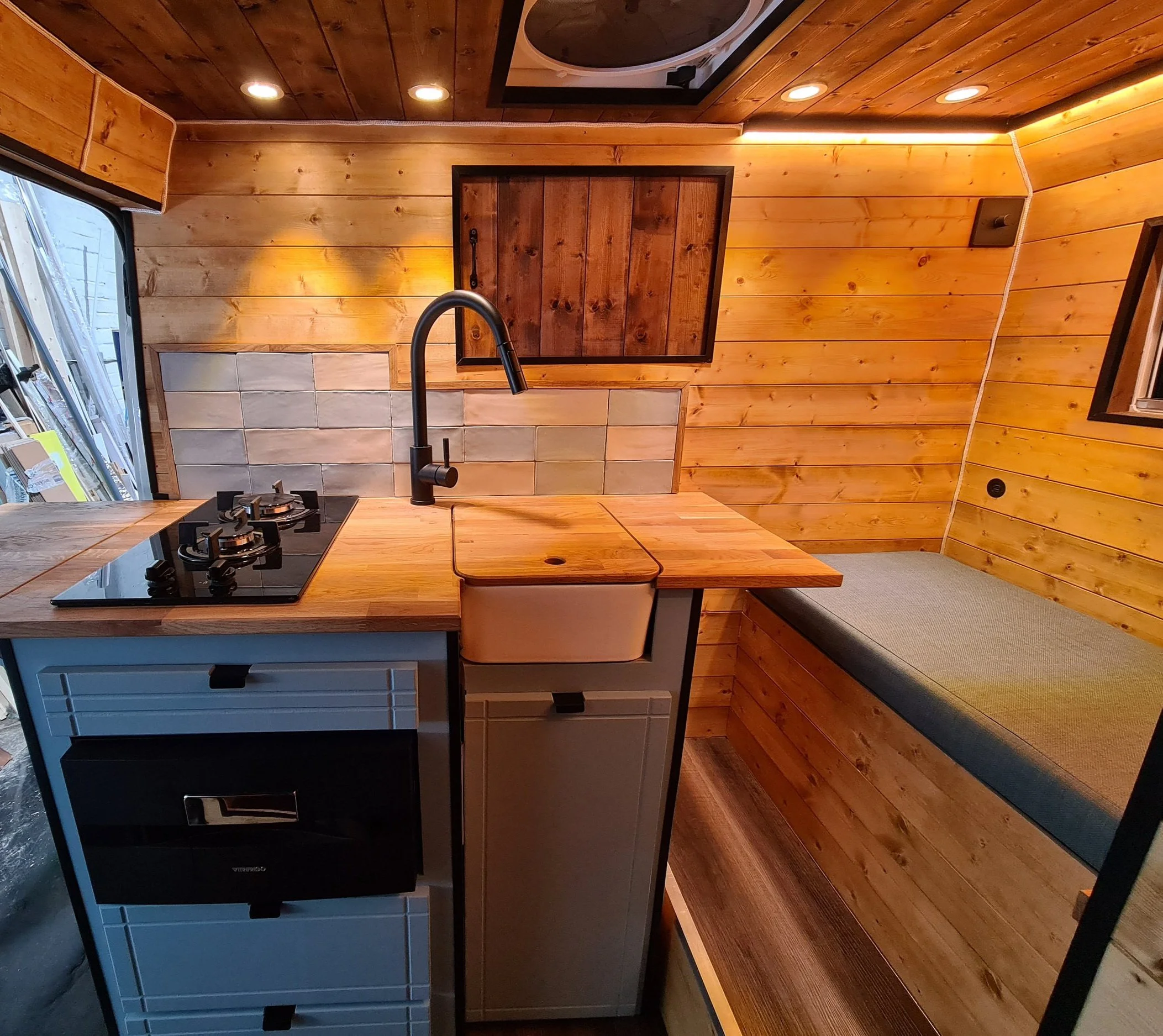 MWB Peugot Boxer. Log burner, Fixed bed, Shower room, Pull out toilet, Kitchen, Dining area for 2. Photo 3 of 5.