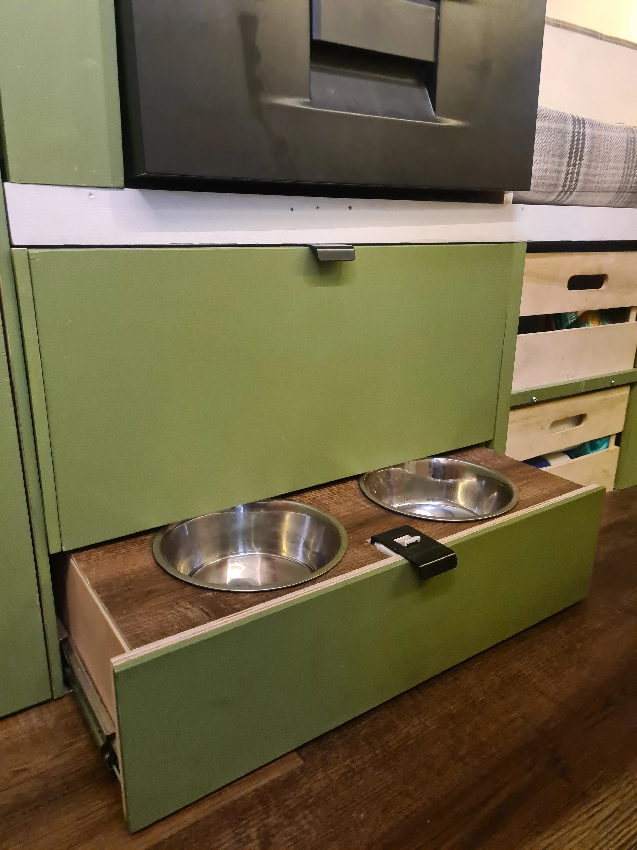 SWB Fiat Ducato. Fully off grid, Gas free, Lifting bed, Seating for 4, Live edge yew table, Kitchen, Full height wardrobe, Composting toilet. Photo 12 of 22.