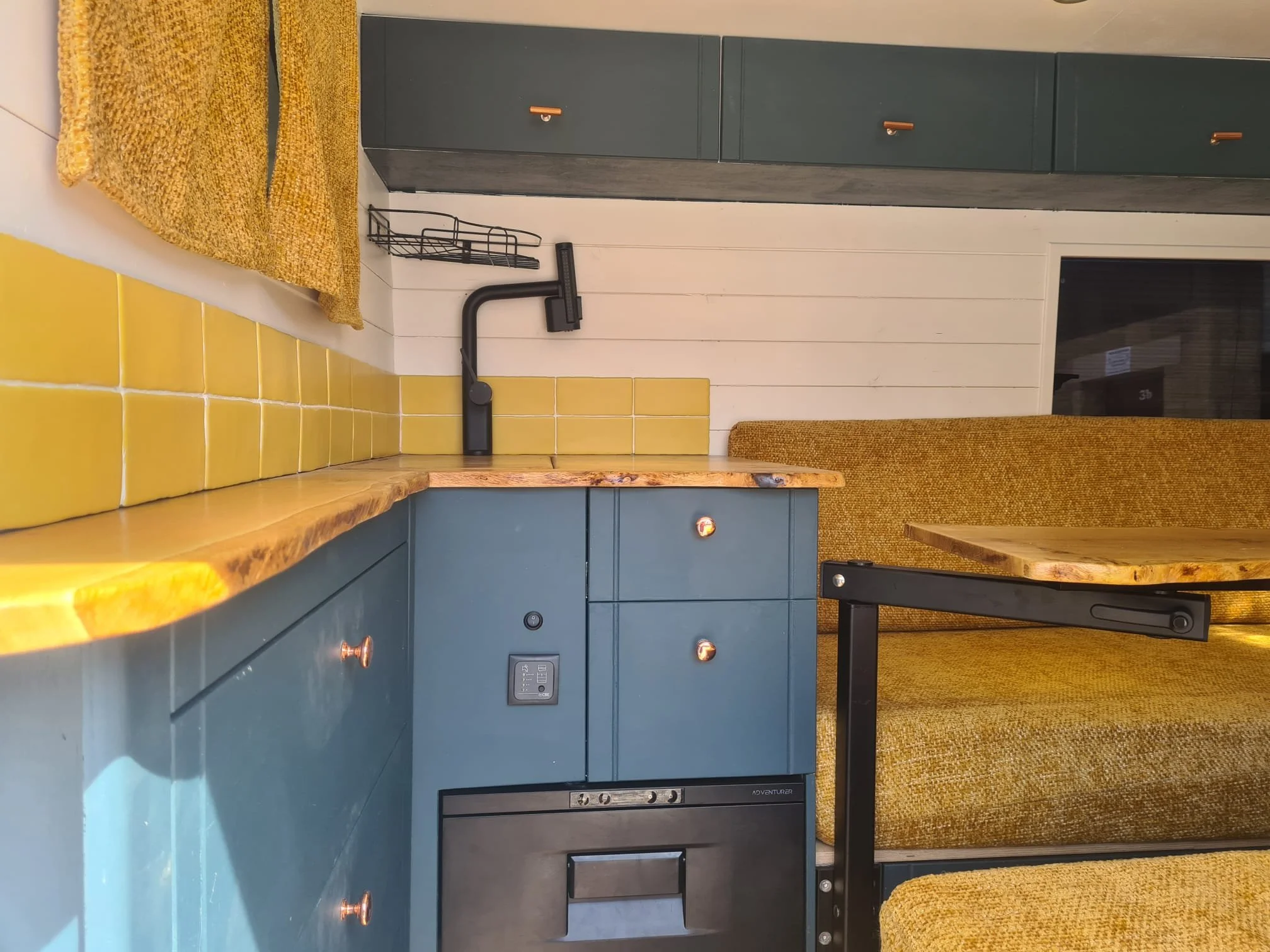 SWB Peugeot Boxer. Fully off grid, Gas free, Super king bed, Large dining area. Photo 3 of 4.