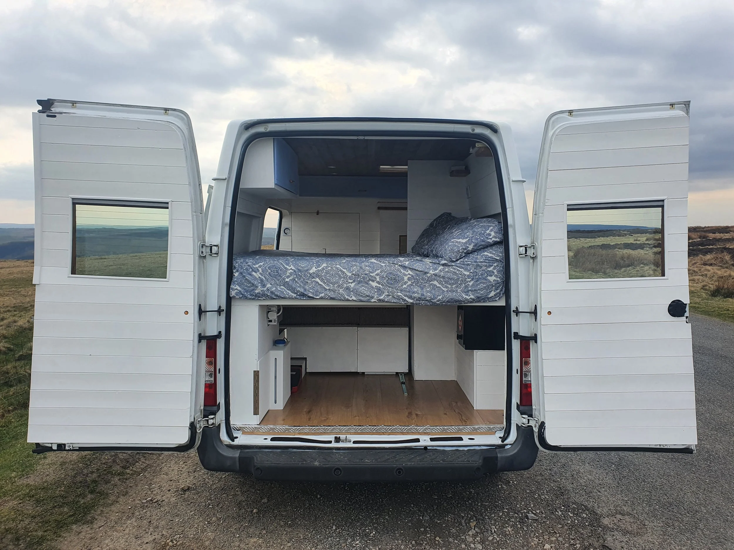 Transit L1H2 2013. Fixed bed, Folding table, Sofas, Kitchenette, Dining area, Copper handles and taps. Photo 8 of 8.