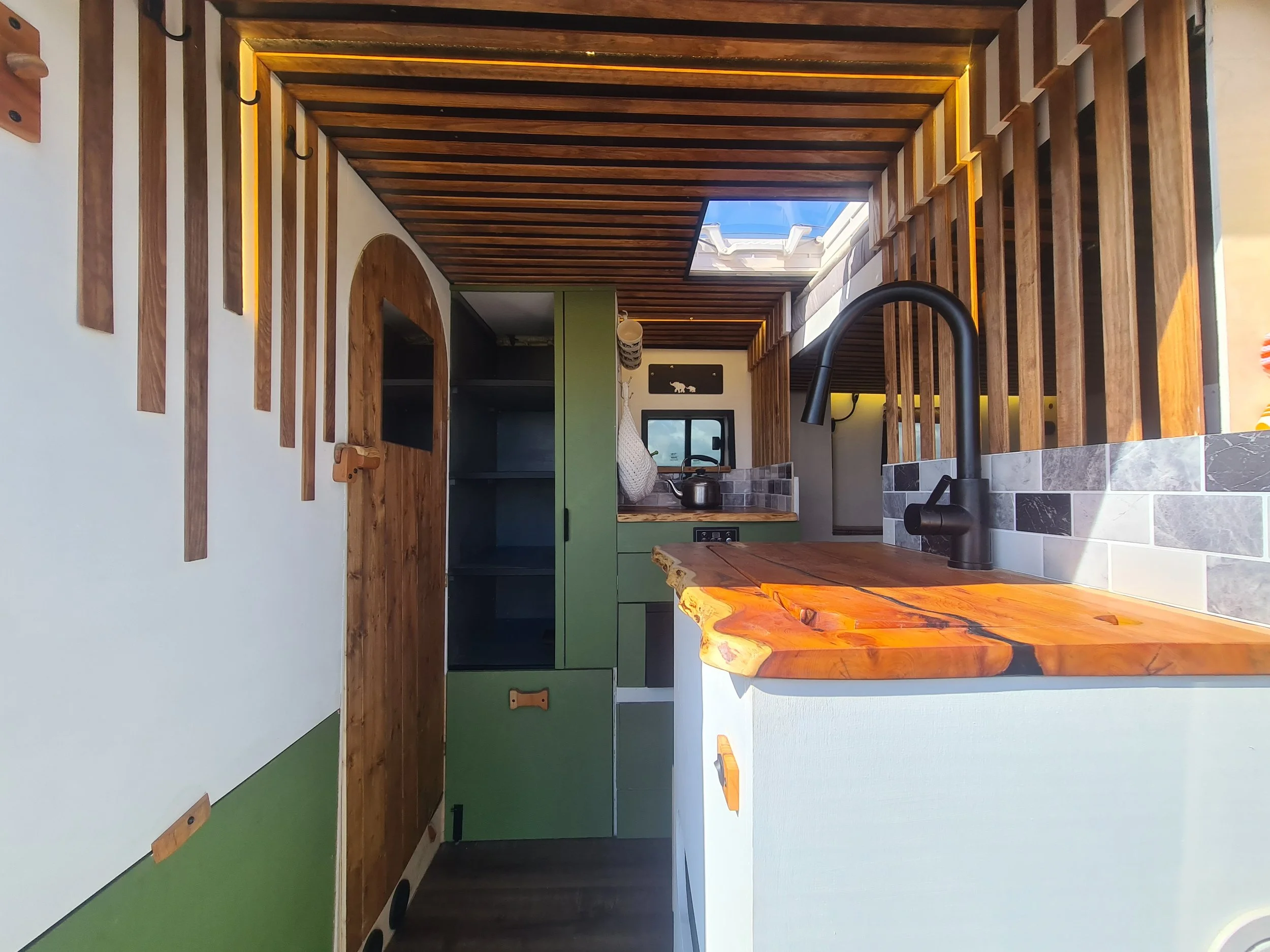 SWB Fiat Ducato. Fully off grid, Gas free, Lifting bed, Seating for 4, Live edge yew table, Kitchen, Full height wardrobe, Composting toilet.