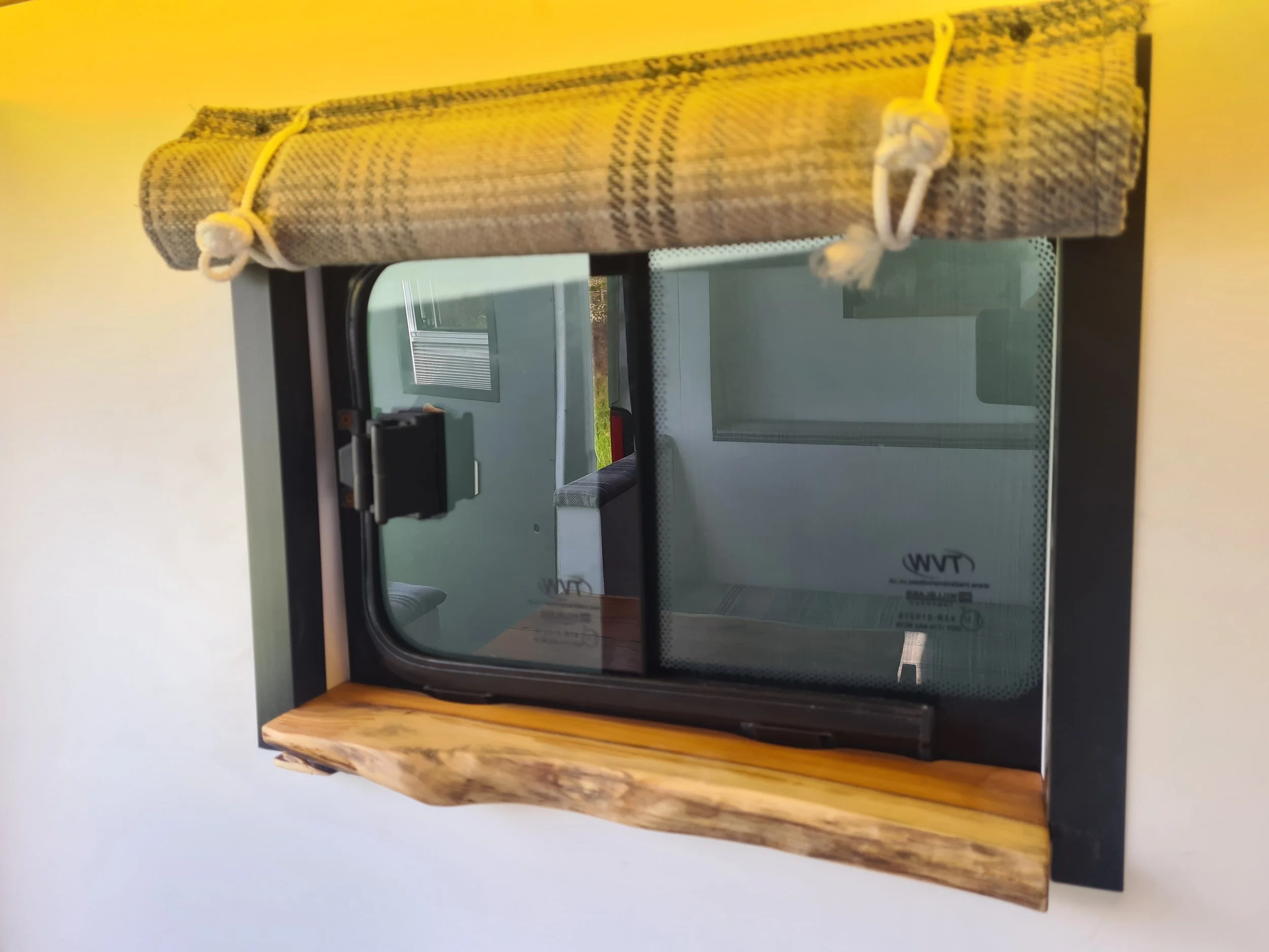 SWB Fiat Ducato. Fully off grid, Gas free, Lifting bed, Seating for 4, Live edge yew table, Kitchen, Full height wardrobe, Composting toilet. Photo 18 of 22.