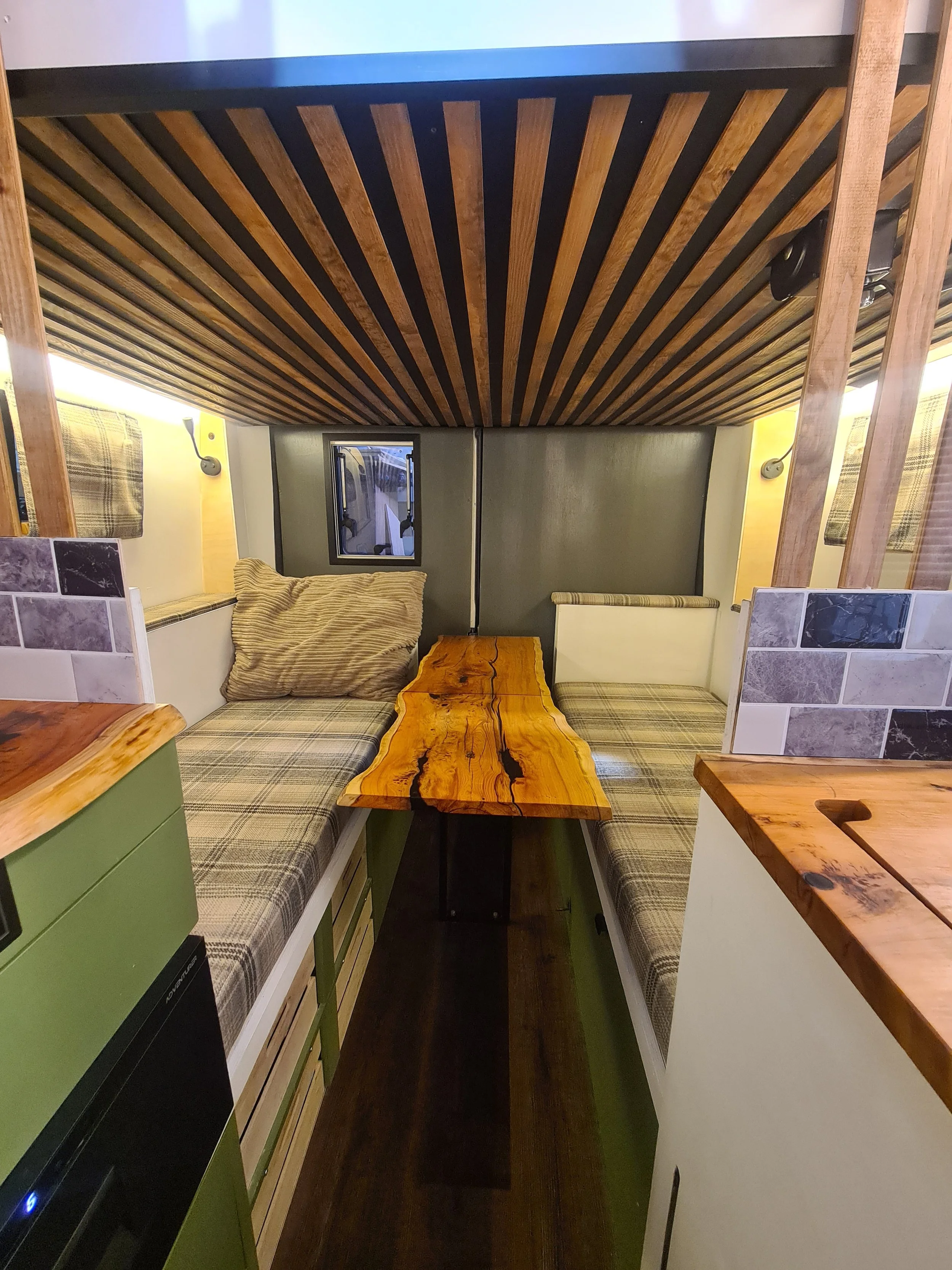 SWB Fiat Ducato. Fully off grid, Gas free, Lifting bed, Seating for 4, Live edge yew table, Kitchen, Full height wardrobe, Composting toilet. Photo 8 of 22.